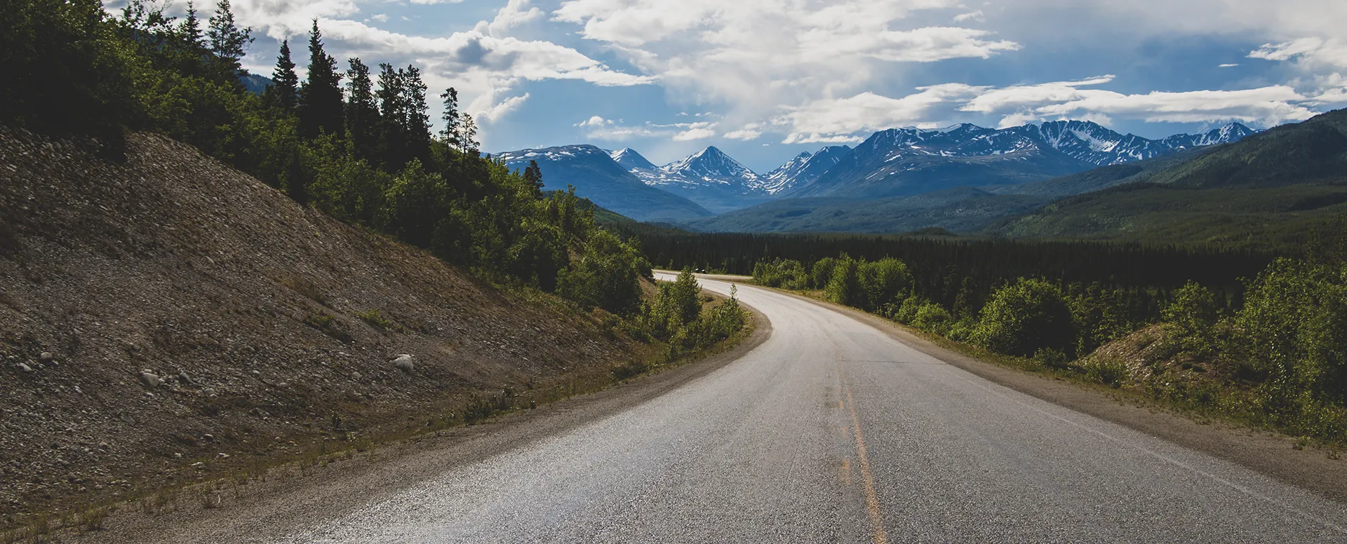 Alaska Highway with Yukon Mountain Scenery