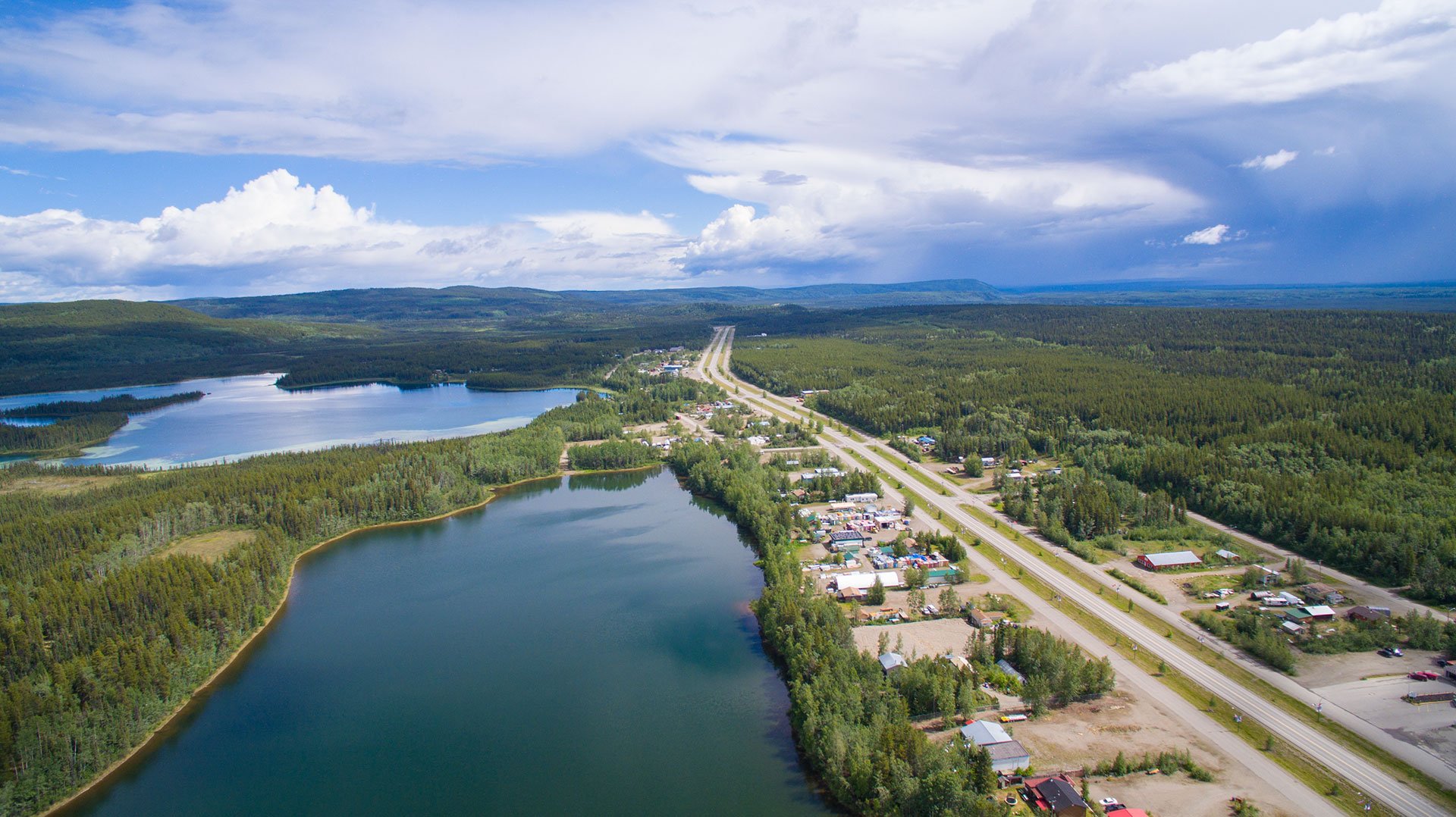 Aerial photo of Watson Lake, Yukon showing lakes and the Alaska Highway